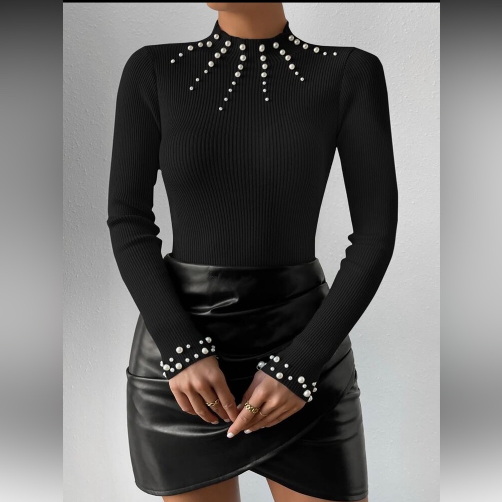 Black long sleeve sweater with pearl details
